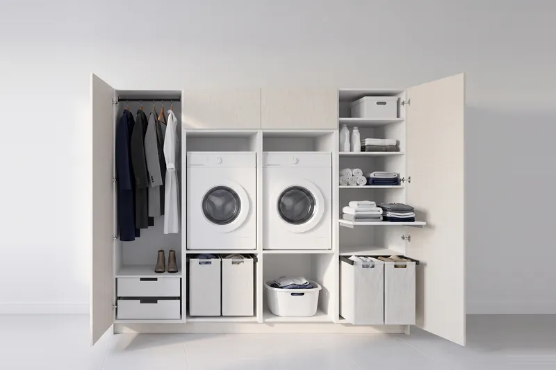 Impressie: twee wasmachinekasten met twee kasten, 253,9 cm breed en 210 cm hoog, fronten in structuur, met deuren open.